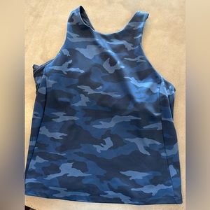 Athleta workout tank. Worn 2 times. Built in shelf bra. Size large.